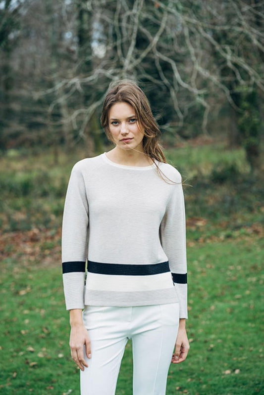 Jersey de punto beige con franjas