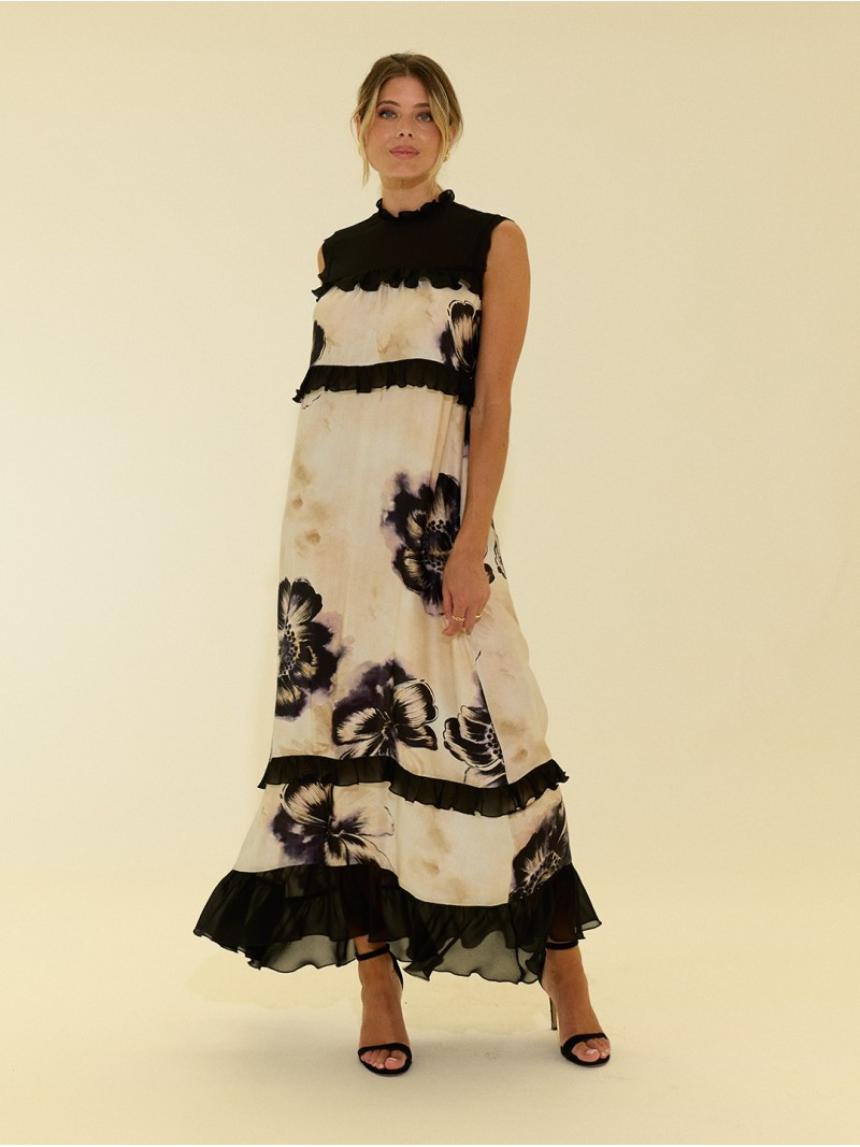 Vestido estampado con volantes en contraste.